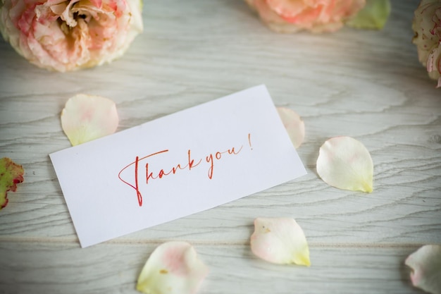 Bouquet of beautiful roses on a wooden table