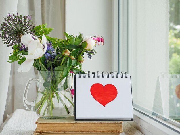 Bouquet of bright flowers standing in a vase