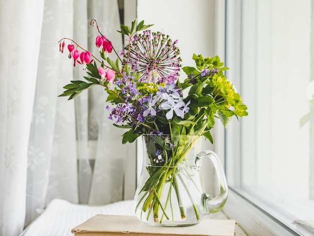 Bouquet of bright flowers on the table