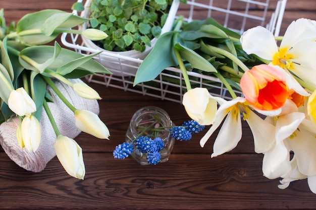 A bouquet of collected flowers in a basket Floristry bouquet design