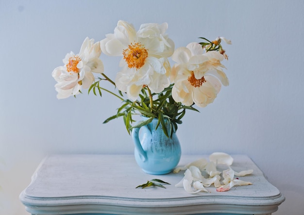 bouquet of delicate white peonies  in the interior, still life