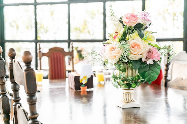 bouquet flower in vase decoration on table