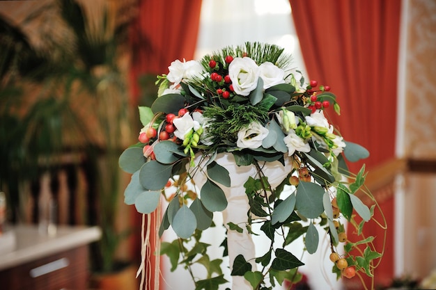 Bouquet of flowers on decorative metal stand