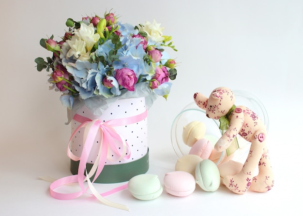 Bouquet of flowers, marshmallows and handmade teddy bear