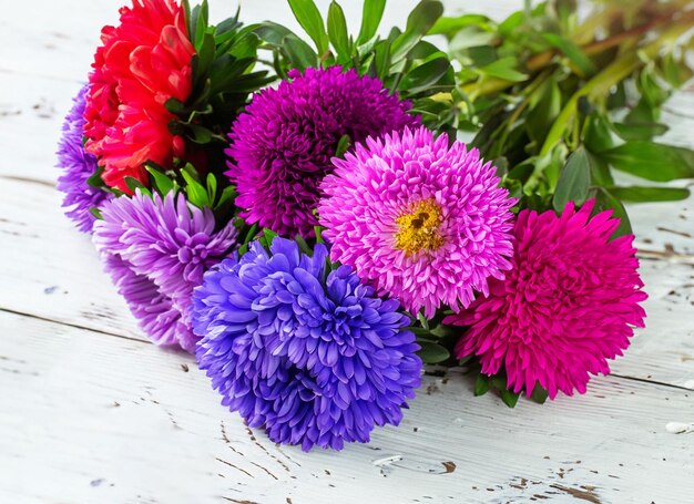 bouquet of flowers on white wooden table