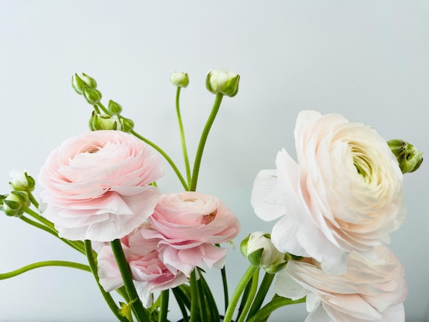 A bouquet of flowers with one that says " i love you "