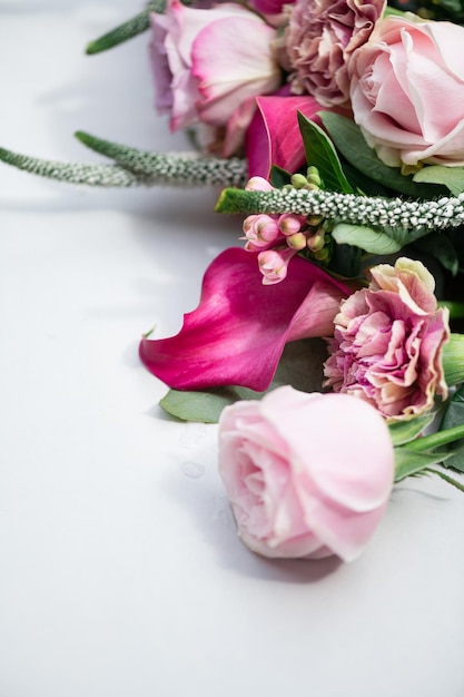 Bouquet from roses and cala lilies