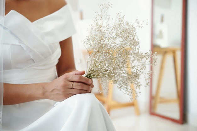 Bouquet in Hands of Bride