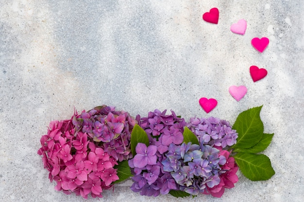 bouquet of hydrangea and five colored hearts from felt