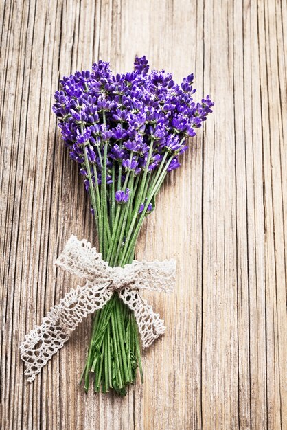 Bouquet of lavender flowers on wooden.