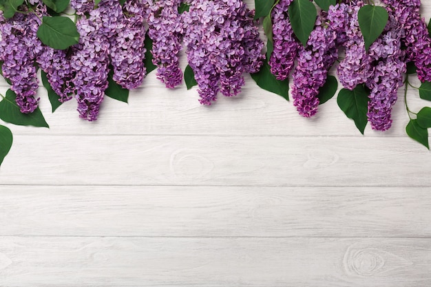 A bouquet of lilacs on white boards . Mother's day