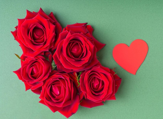 Bouquet of one hundred red roses celebration of engagement or wedding red roses as a background closeap