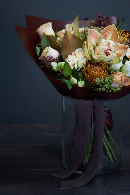 Bouquet in pastel colors in vintage style on dark