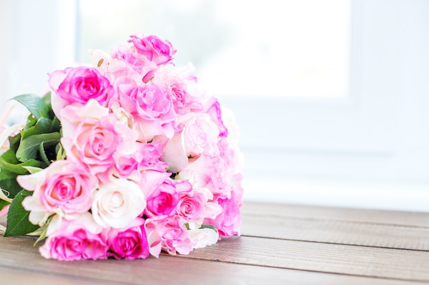 Bouquet of pink roses. Place for the inscription. 