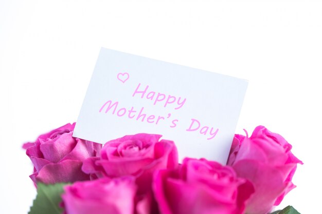 Bouquet of pink roses with happy mothers day card 