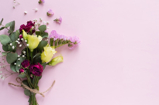 Bouquet on pink table