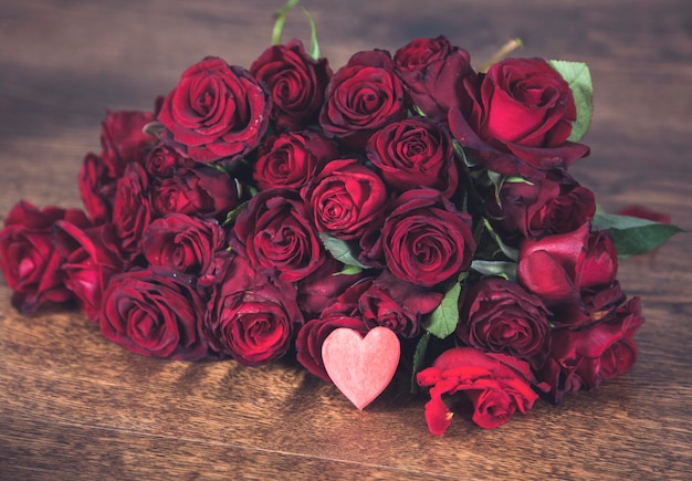 Bouquet of red roses with heart