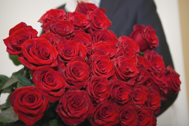 Bouquet of roses. Red flowers as background