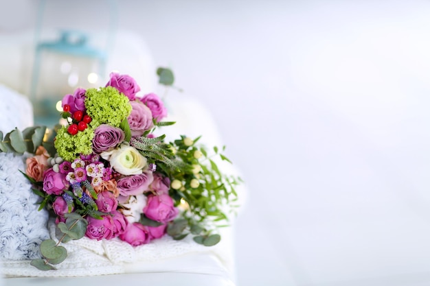 Bouquet of roses on a woolen blanket closeup