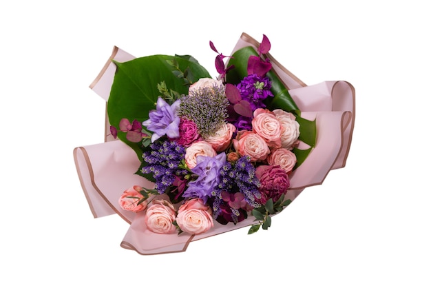 Bouquet of soft pink flowers in pink wrapping paper
