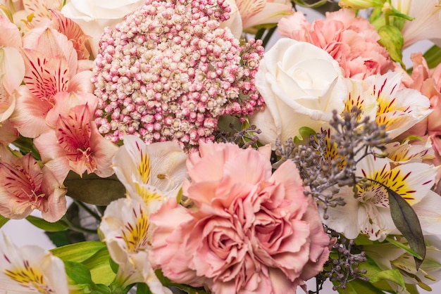 Bouquet of Soft Pink Flowers in Wrapping Paper Stock Photo - Image of  fresh, concept: 211367206