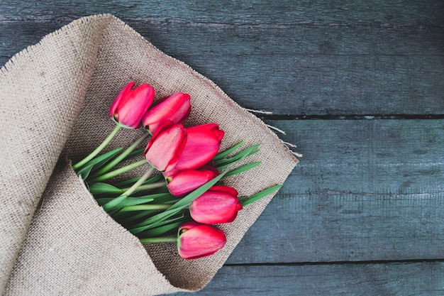 Bouquet tulip on a wooden table