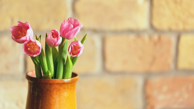 Bouquet of tulips in ceramic vase