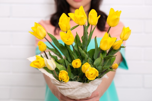 Bouquet of tulips in hands