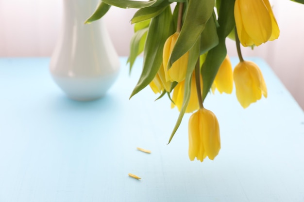 A bouquet of tulips on the table