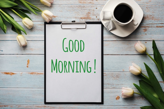 Bouquet of white Tulip flowers with a Cup of coffee