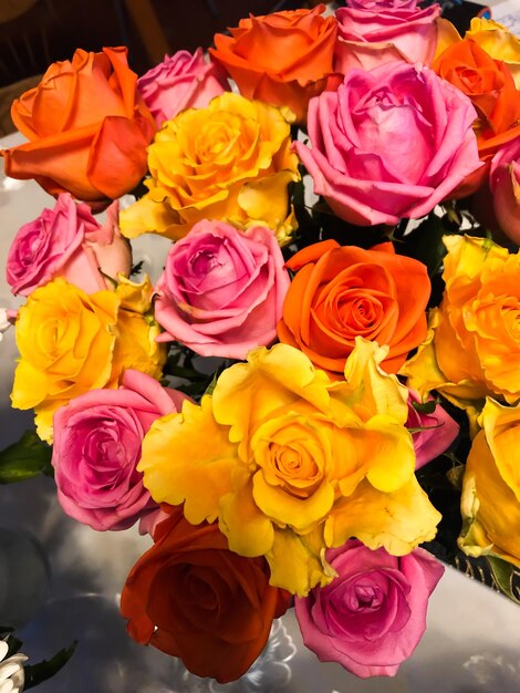 Photo bouquet of yellow orange pink roses