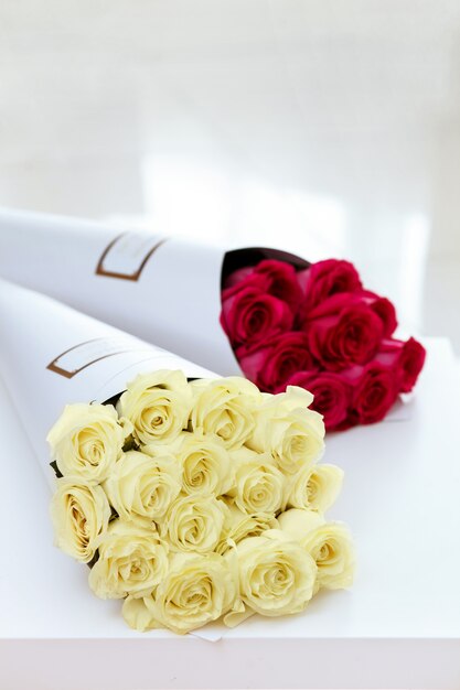 Bouquets of white and red roses