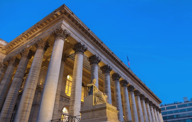 The Bourse of Paris Brongniart palace at nightParis France