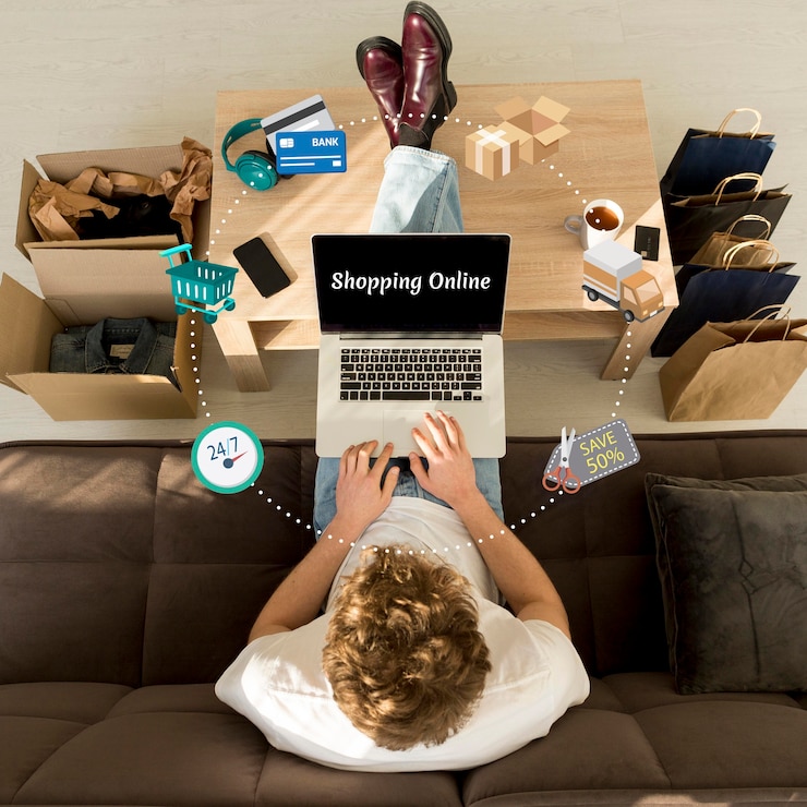 Foto bovenaanzicht man online winkelen op zijn laptop doen