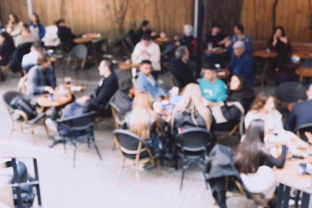 Bovenaanzicht van Blur coffeeshop of café-restaurant met abstracte bokeh lichte afbeelding achtergrond