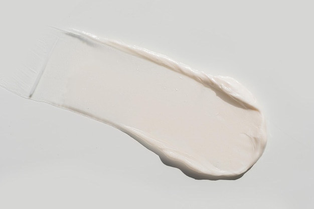 Bovenaanzicht van de cosmetische crème op witte achtergrond verschillende stalen pastelkleuren goed als cosmetica