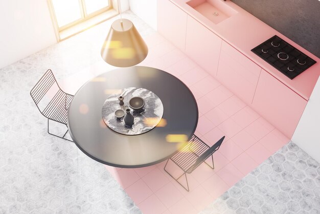 Bovenaanzicht van ronde keukentafel met metalen stoelen in de keuken met witte muren en roze werkbladen. 3D-rendering getinte afbeelding