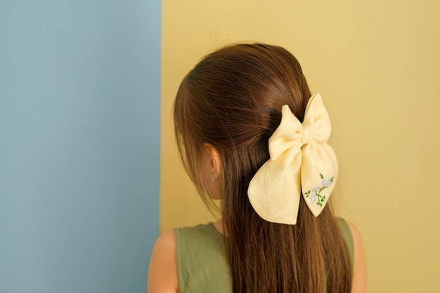 Bow is an accessory for the hair on the girl's head