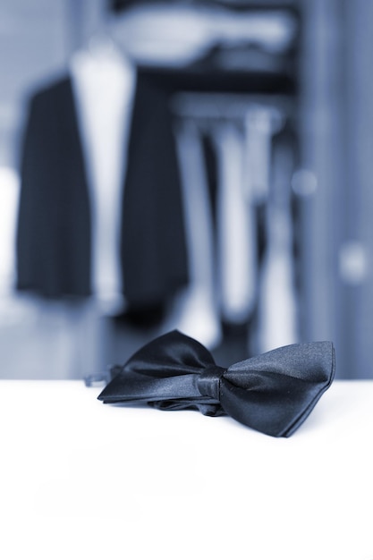 Bow tie open closet and tuxedo