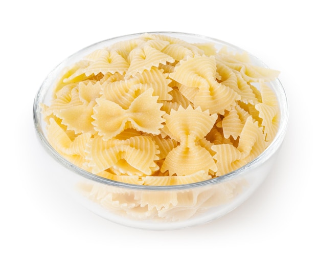 Bow tie pasta in glass bowl isolated on white background with clipping path