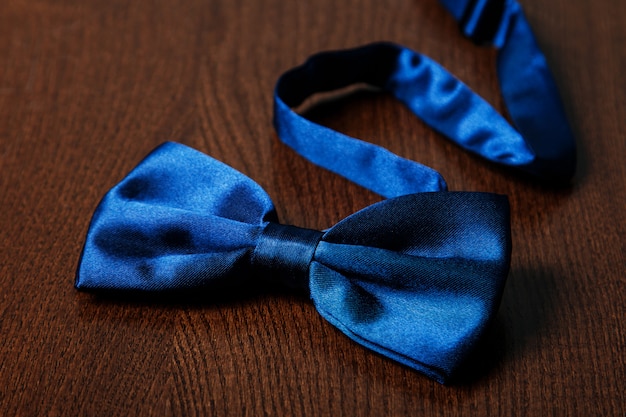 Bow tie on wooden table