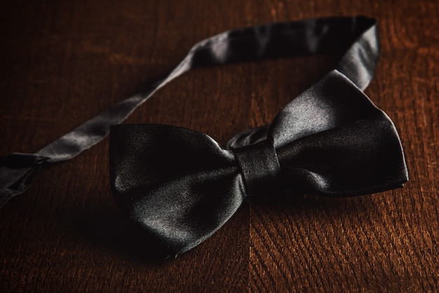 Bow tie on wooden table