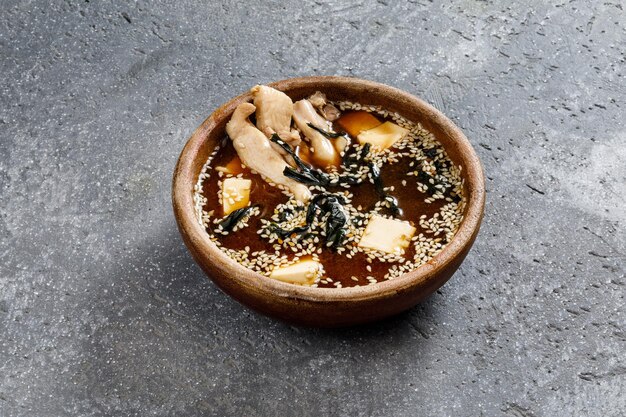 Bowl of asian soup with seafood