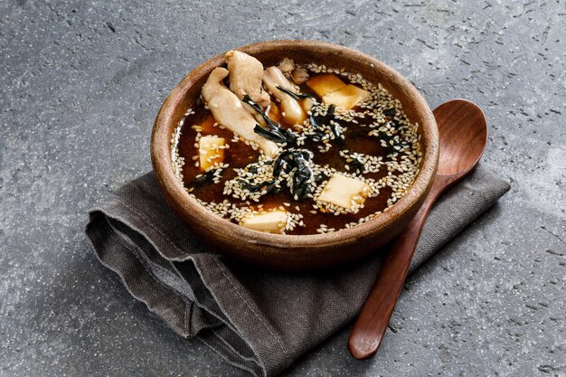 Bowl of asian soup with seafood