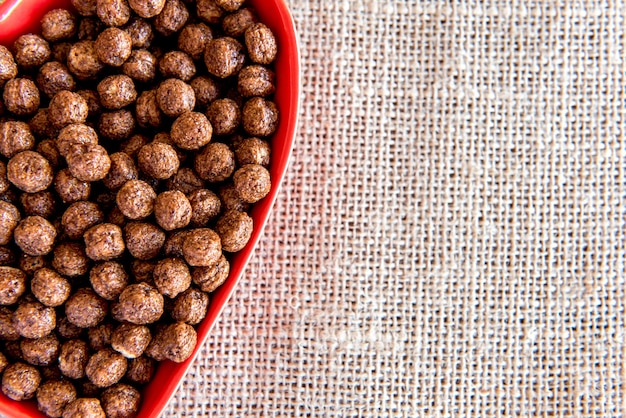 Bowl of Ball Cornflakes with space for text.