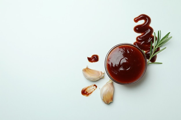 Bowl of barbecue sauce and spices isolated