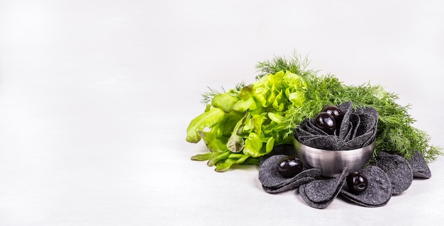 Bowl of black chips