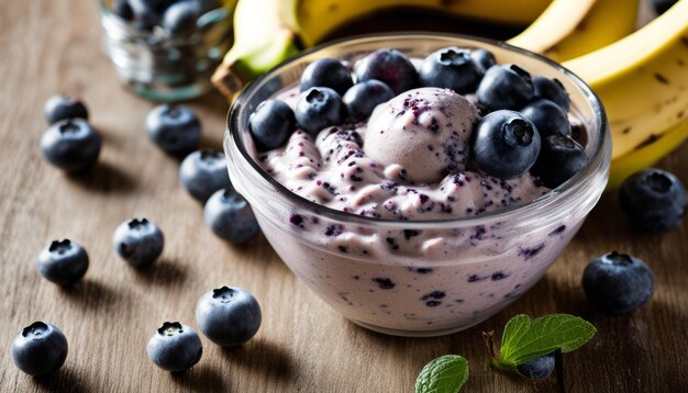 A bowl of blueberry yogurt with a spoon in it