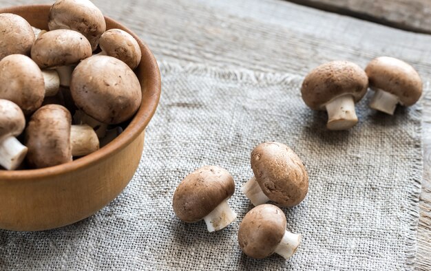 Bowl of brown champignon mushrooms