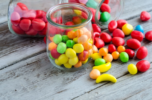 Bowl on candies. Colorful sweets on table